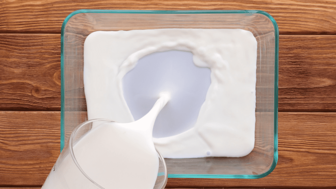 Pour milk into another shallow dish.