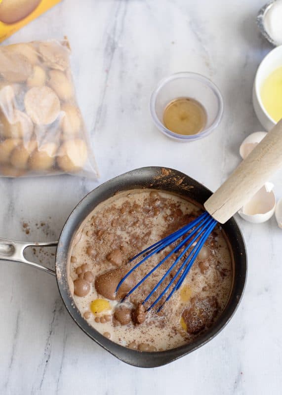 Add milk and yolks to dry ingredients.