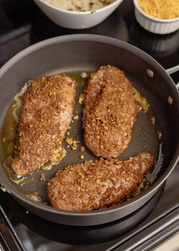 Add chicken to skillet.