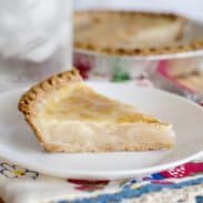 Water pie slice on a white plate.
