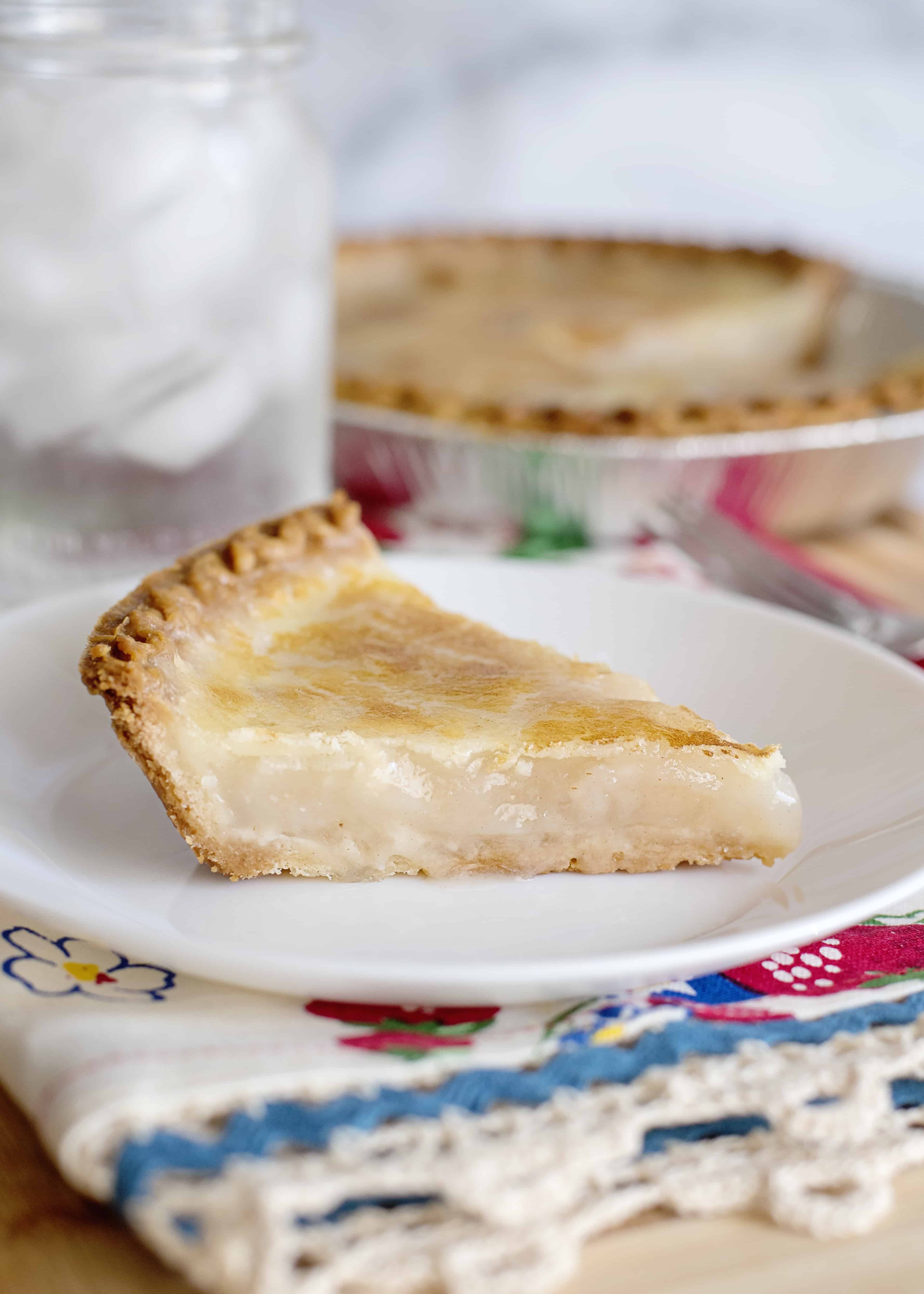Water pie slice on a white plate.