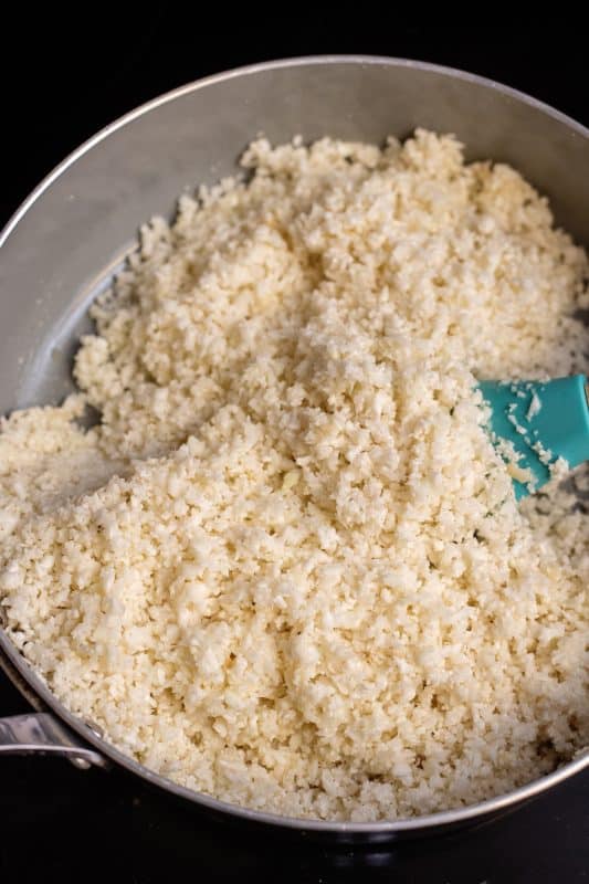 Cauliflower rice in skillet.