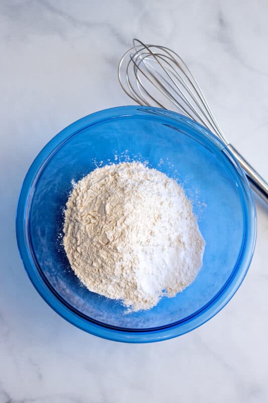 In a different bowl, mix together the flour, baking soda, and salt.