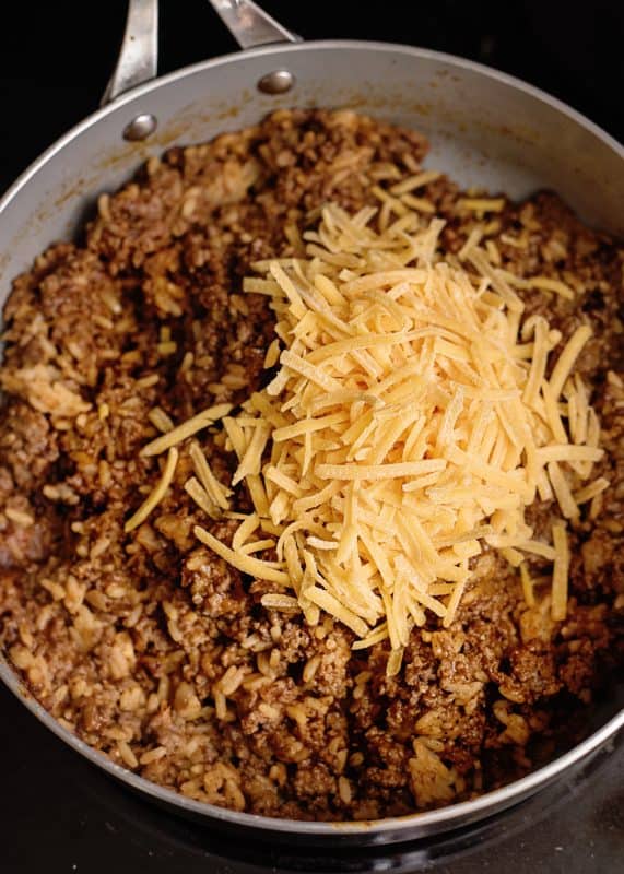 Making meat mixture for stuffed peppers with ground turkey.