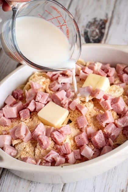 Pour milk into casserole dish.