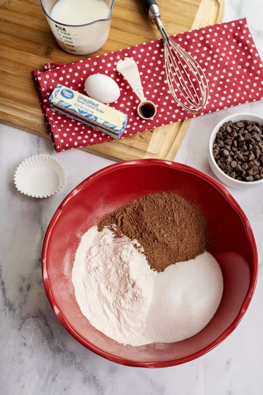 Place sugar, flour, and cocoa powder in a medium bowl.