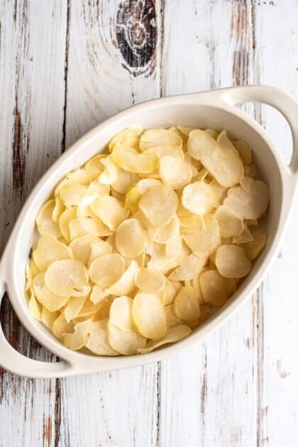 Place potatoes in casserole dish.