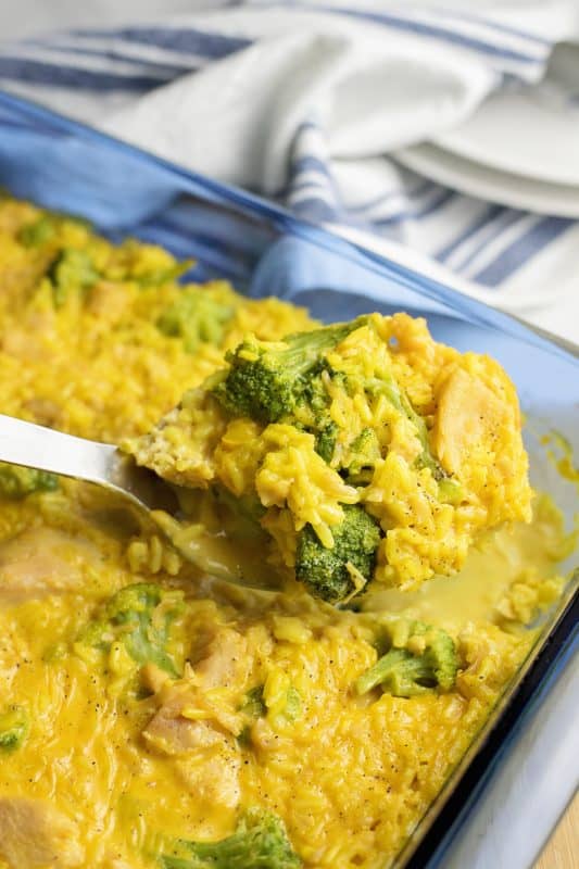 Spoonful of cheesy chicken broccoli casserole.