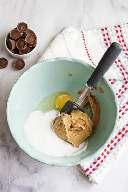 mixing peanut butter cookies