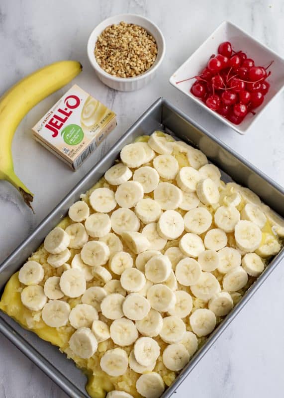 Add sliced banana on top of pineapple.