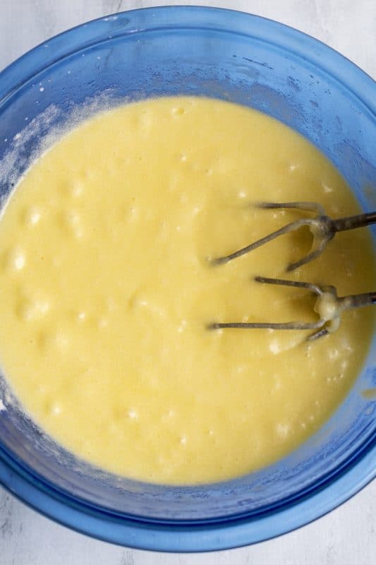 mixing up cake batter with blender