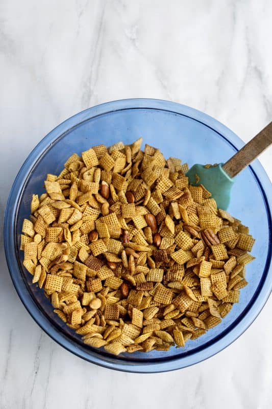 Microwave Chex mix ingredients in bowl.