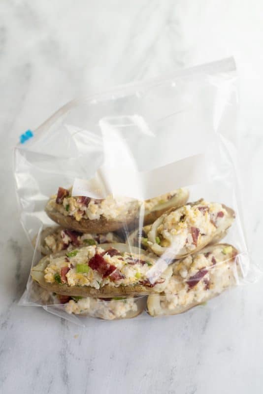 Place loaded potatoes in zipper seal bags to freeze.