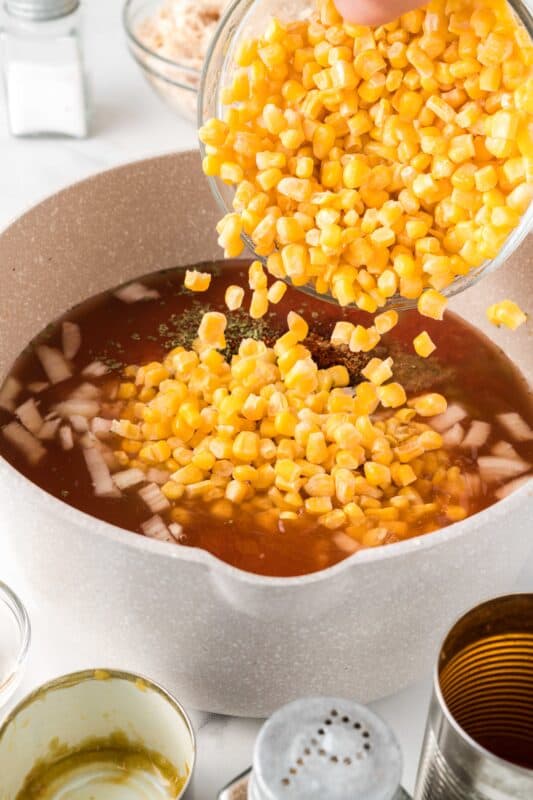 Add corn to saucepot.