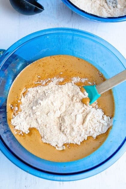 Adding the flour to the molasses mixture for shoofly pie.