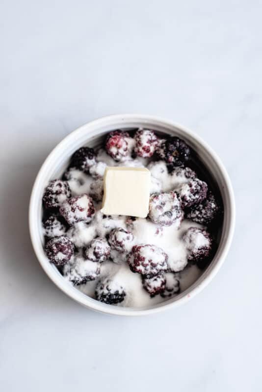 put berries in bowl with butter and sugar and microwave.