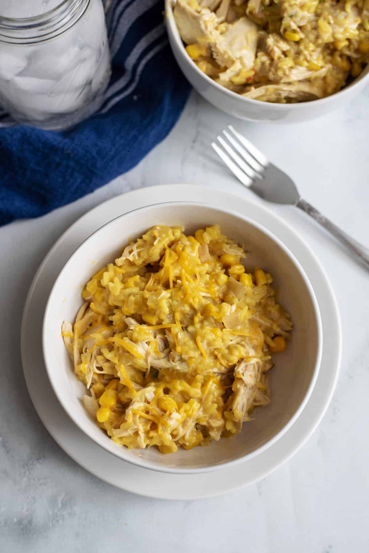 Bowl of cheesy chicken and rice.