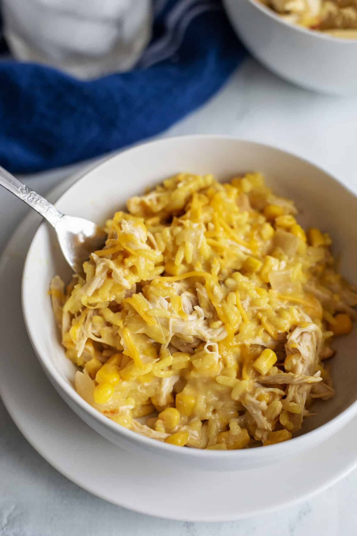 Bowl of cheesy chicken and rice.