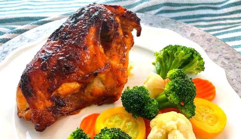 Sticky Chicken on plate with vegetables