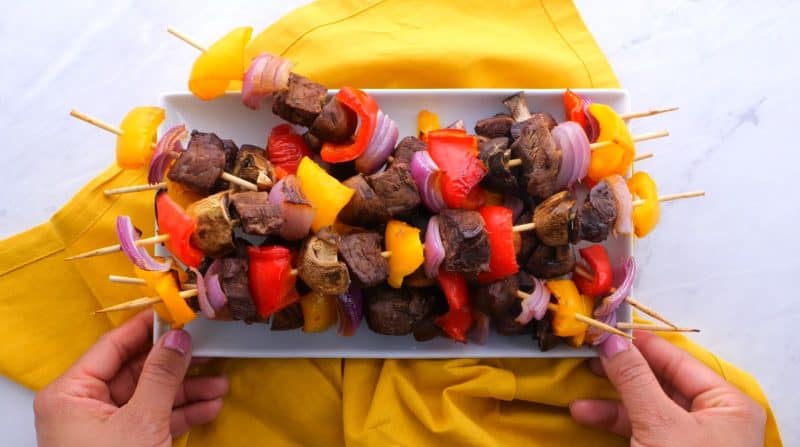 Oven Steak Kabobs - A special meal on a budget Pile of steak kabobs on plate