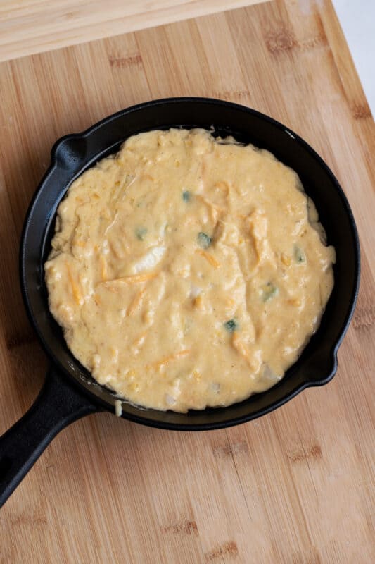 pour batter into the cast iron skillet and bake.