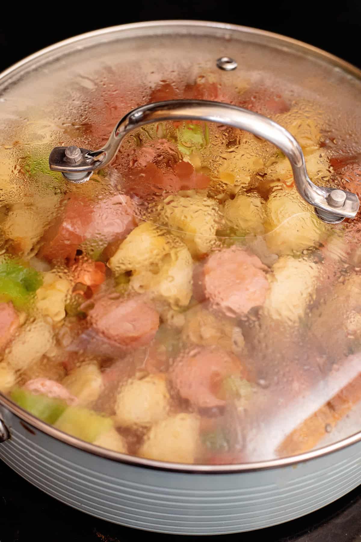Add lid to let potatoes steam.