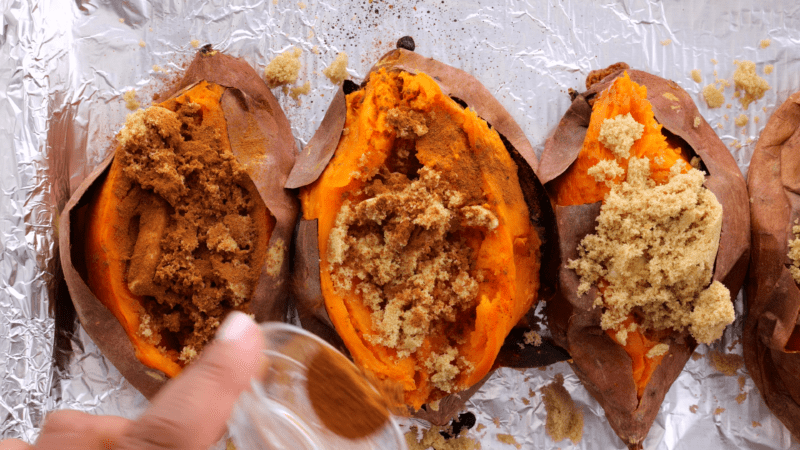 Add ingredients to opened potatoes.