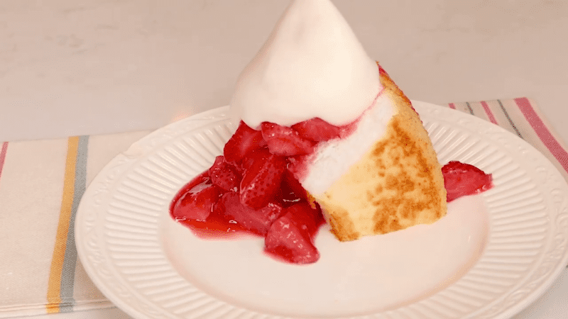 Whipped cream on top of dessert.