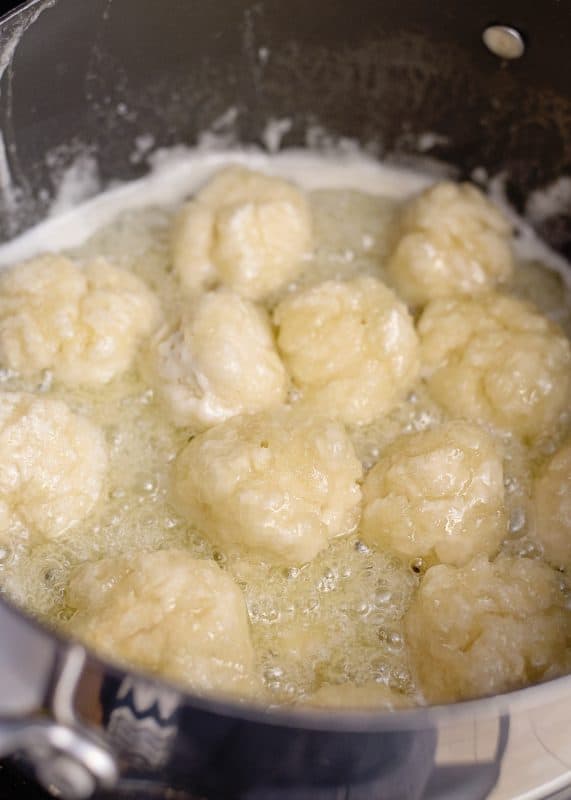 Simmer until dumplings firm.