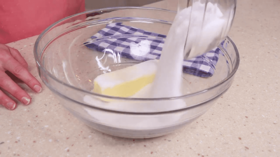 Place butter and sugar in mixing bowl.