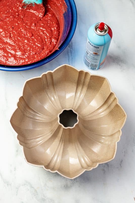 Grease bundt cake pan with cooking spray.
