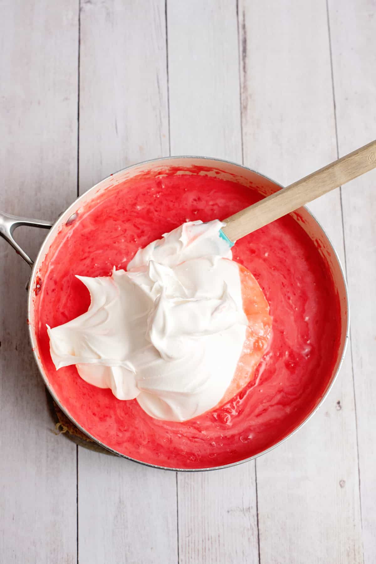 Add whipped topping to pot.