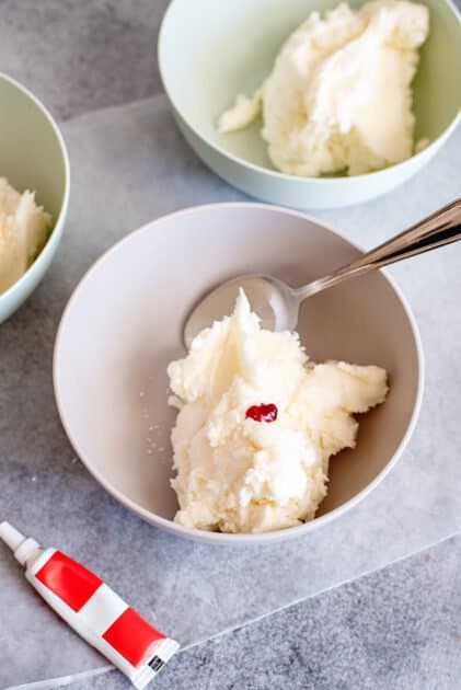 To color mints, separate dough into bowls and add coloring.