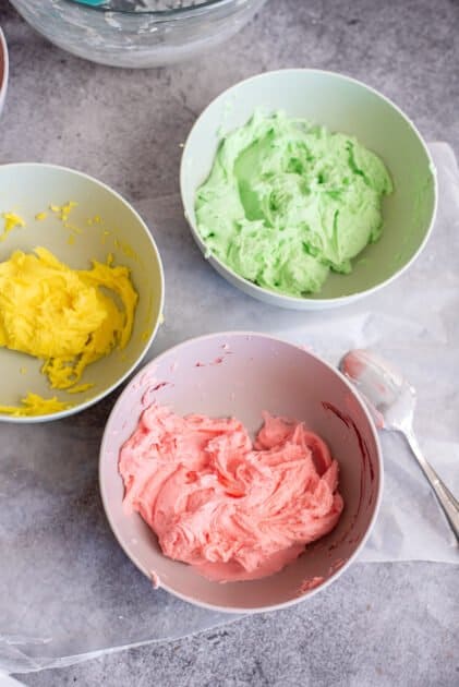 Mix food coloring into bowls.