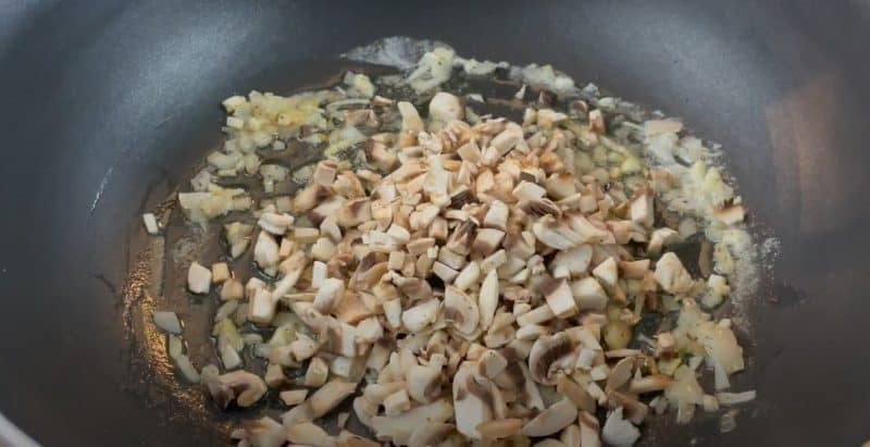 Add mushrooms to sauce.