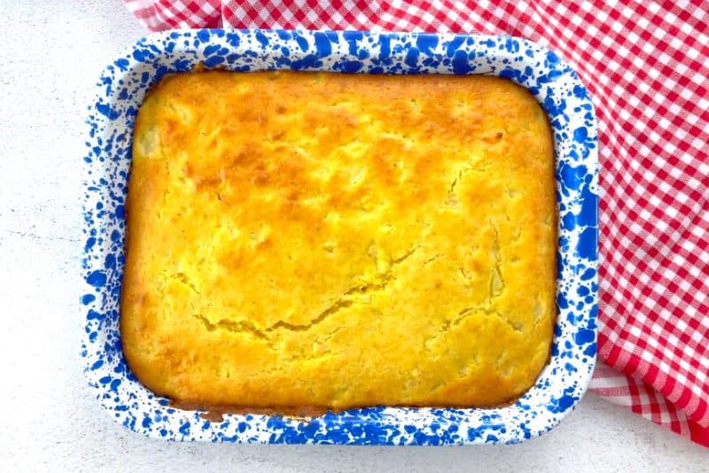 Bake cornbread casserole until golden brown on top.