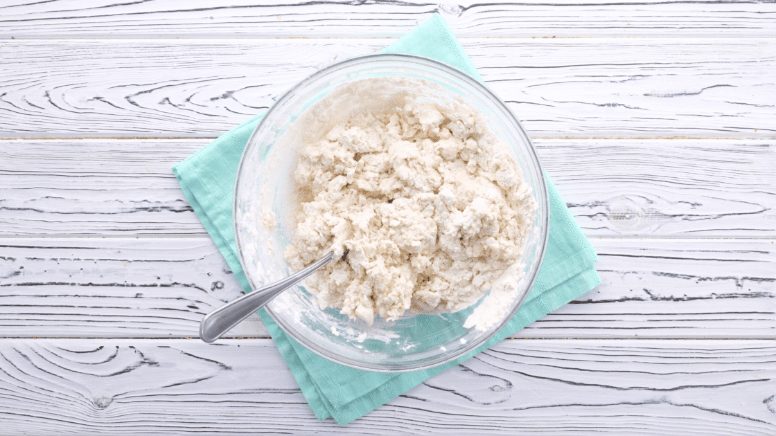 Buttermilk mixed into dough.