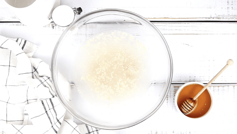 add water and yeast to bowl