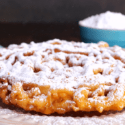 Funnel cake on plate.