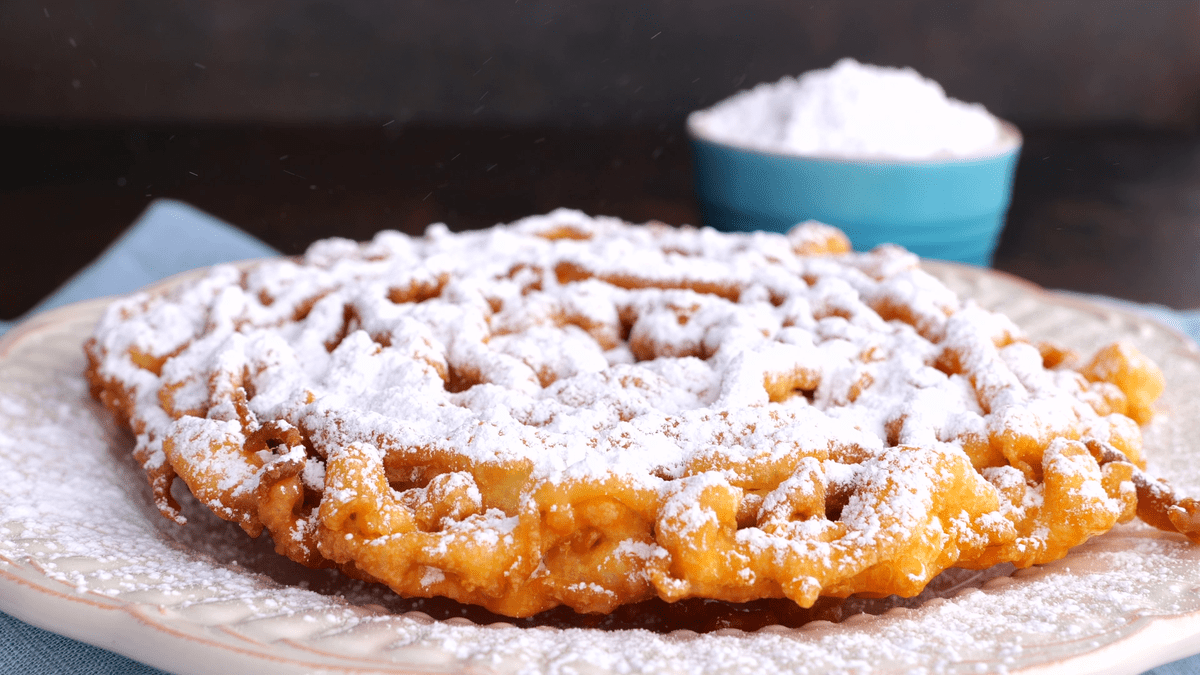 Funnel cake on plate.