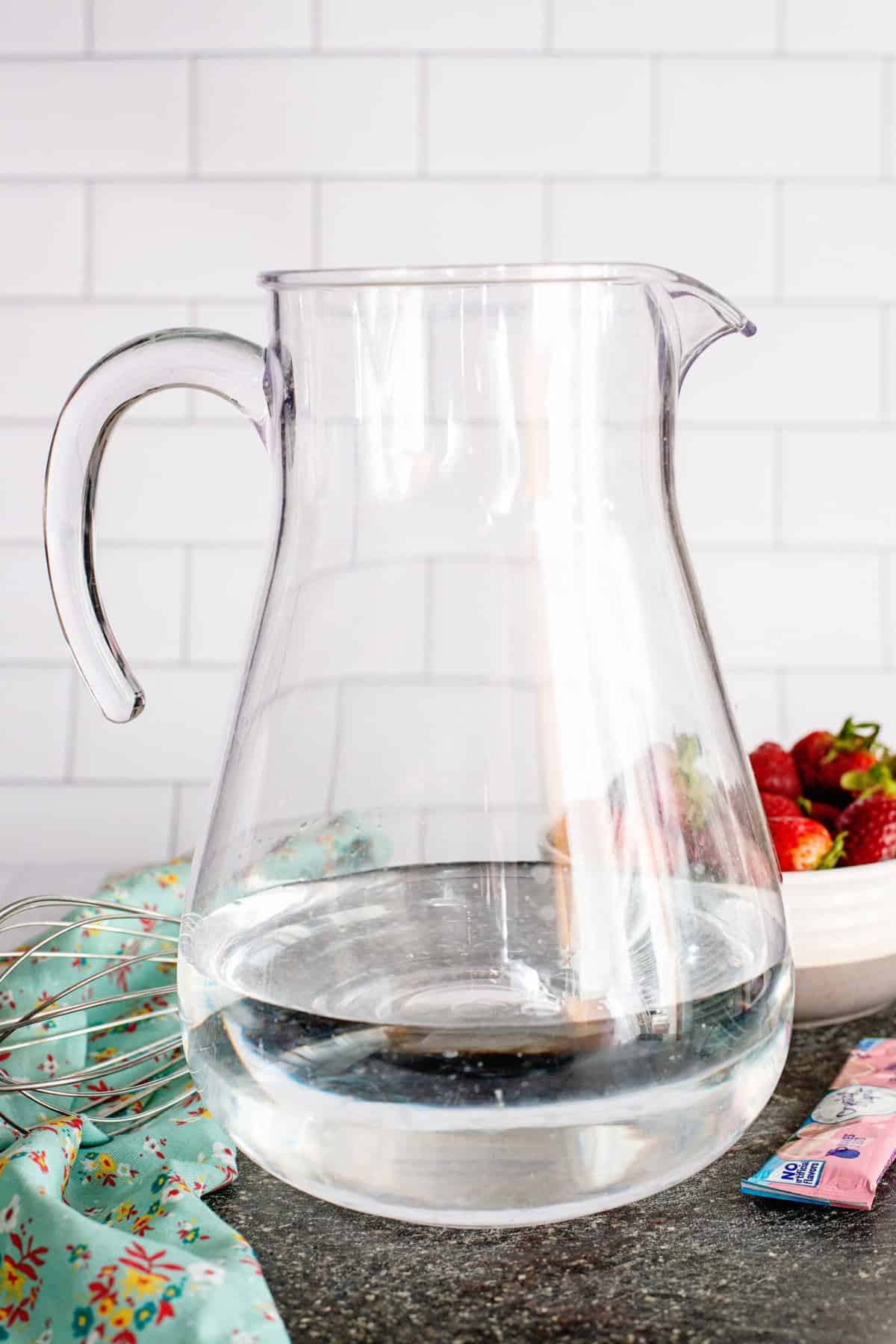 put water into the pitcher