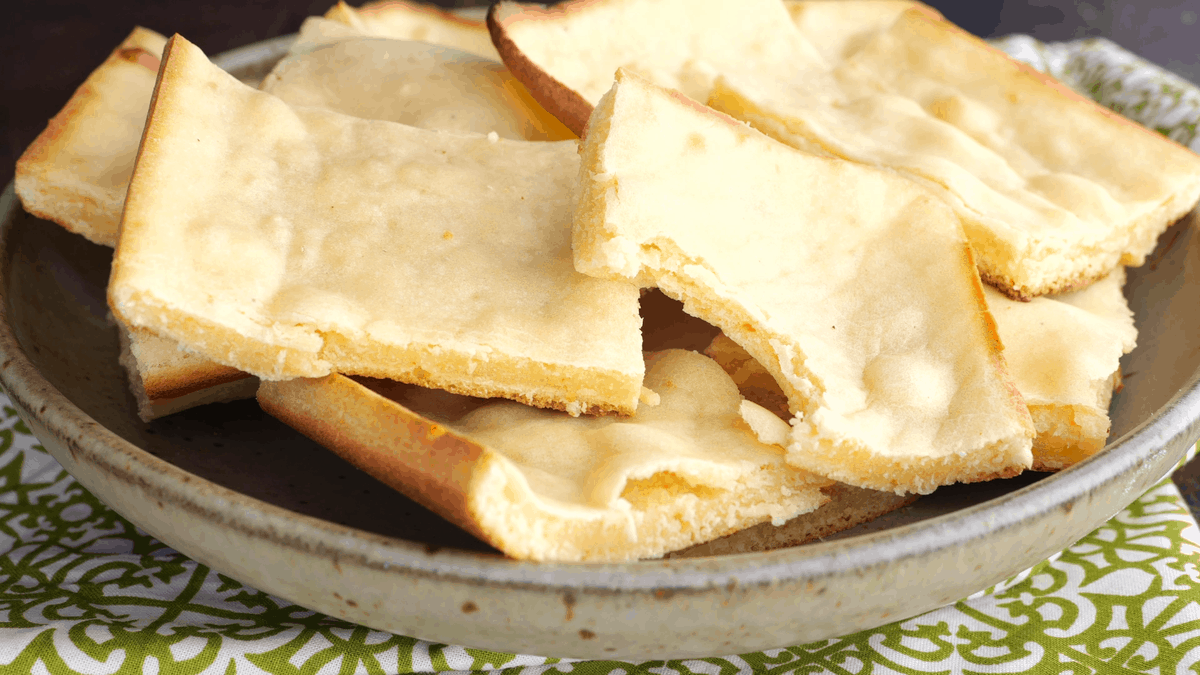 Soft unleavened bread pieces in bowl.