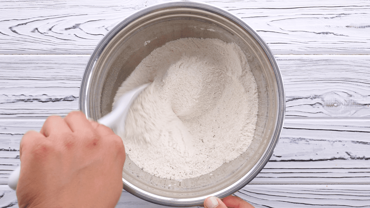 Stirring the dry ingredients for southern style hush puppies