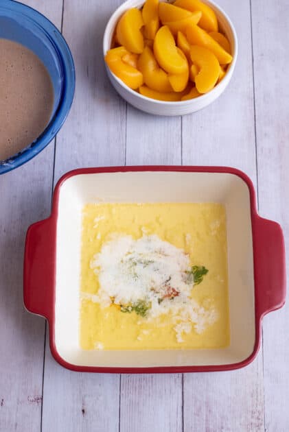 Melted butter in a baking dish.
