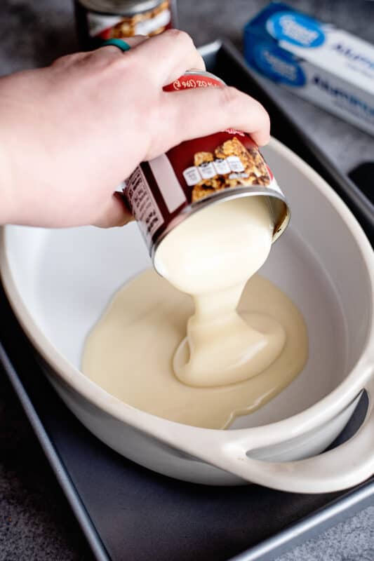 pour the 14oz sweetened condensed milk in deep dish pie plate
