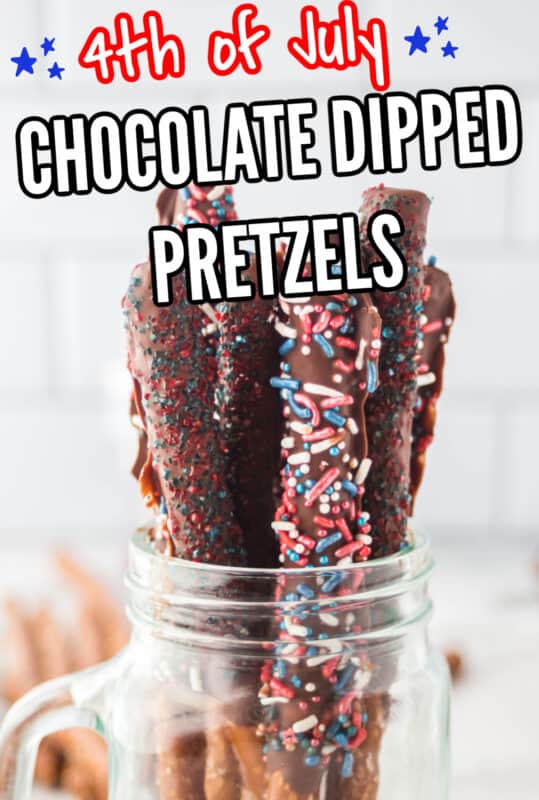 Dipped pretzel Rods in a mason jar on counter 