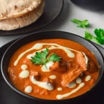 Indian butter chicken in a bowl on table