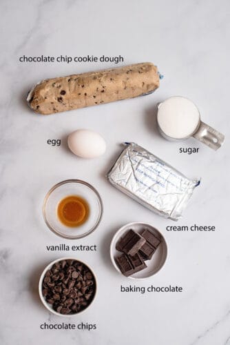 Ingredients with written descriptions for chocolate chip cheesecake bars.