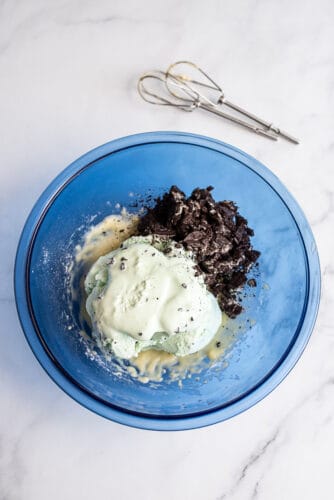 Mint ice cream, crushed Oreos in mixing bowl.