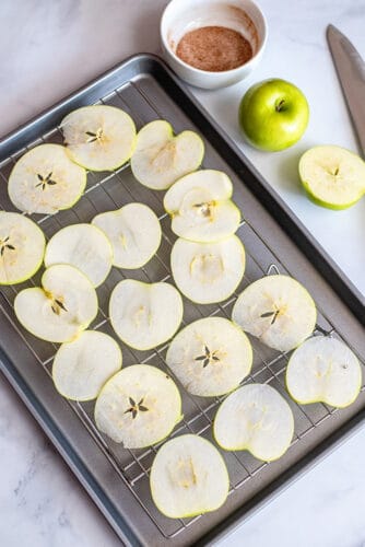 Apple slices on cooling rack.